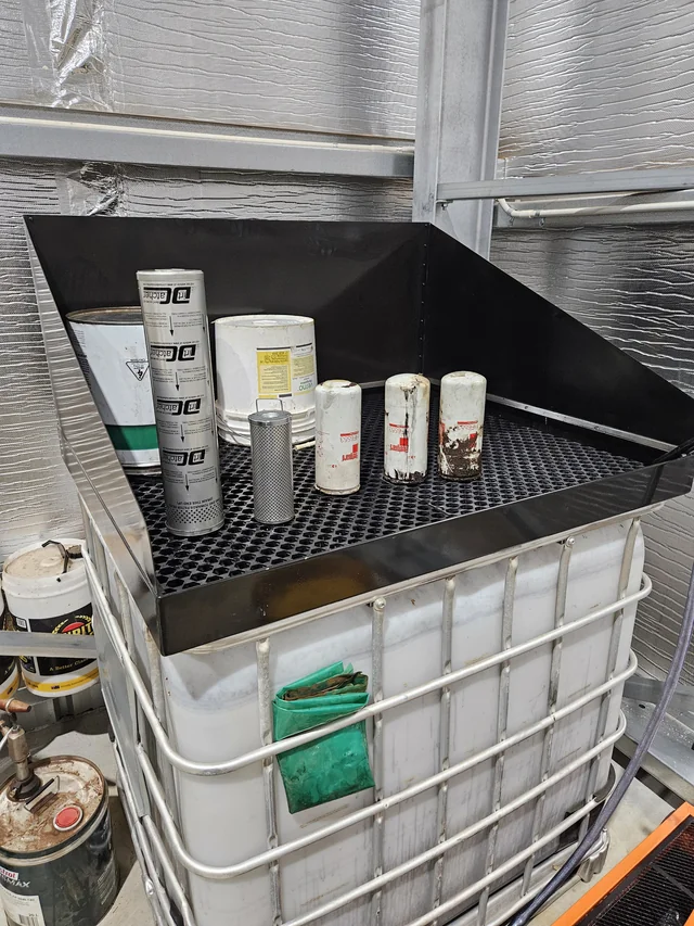 Actual used filters draining on a funnel and IBC; filters and IBC are not included