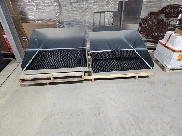 A group of completed funnels in the workshop; photograph does not show current availability